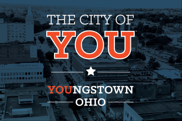 City of YOU logo over an aerial view of Downtown Youngstown