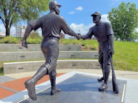 Statue of Jackie Robinson being congratulated by George Shuba at home plate